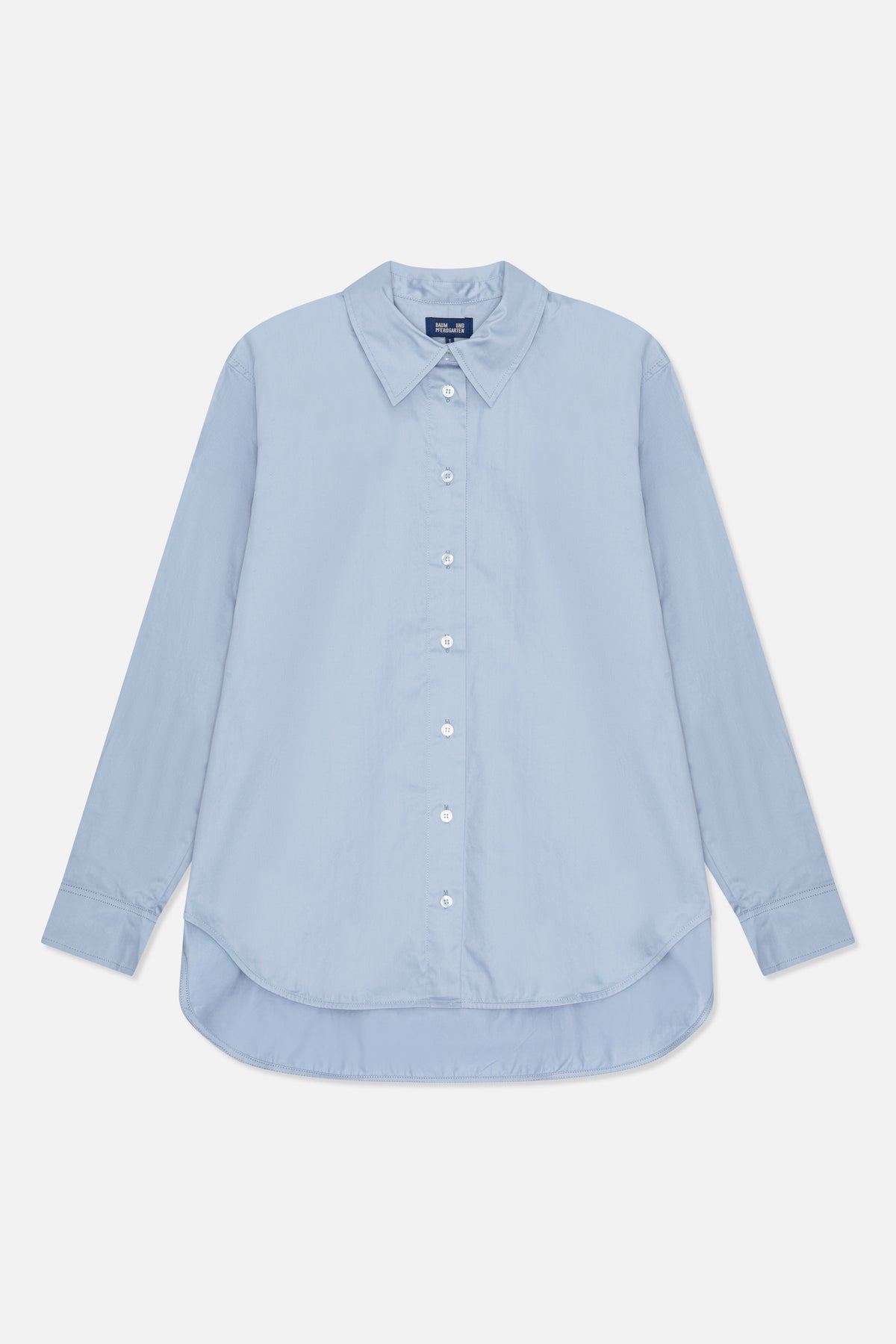 Light blue long-sleeved button-up shirt shown from the front, with a pointed collar, white buttons and a curved hem.