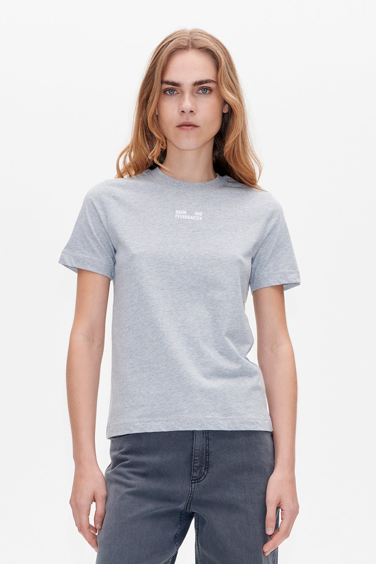 Front view of a heather light grey crew-neck T-shirt with short sleeves and a small white chest logo.