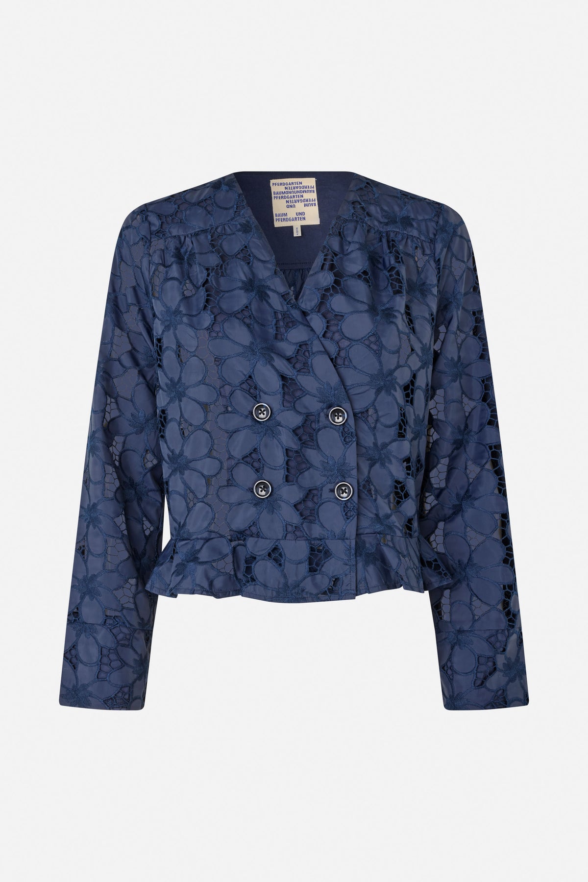 Front view of a navy cropped jacket with a floral openwork pattern, notched lapels, long sleeves and double-breasted buttons.