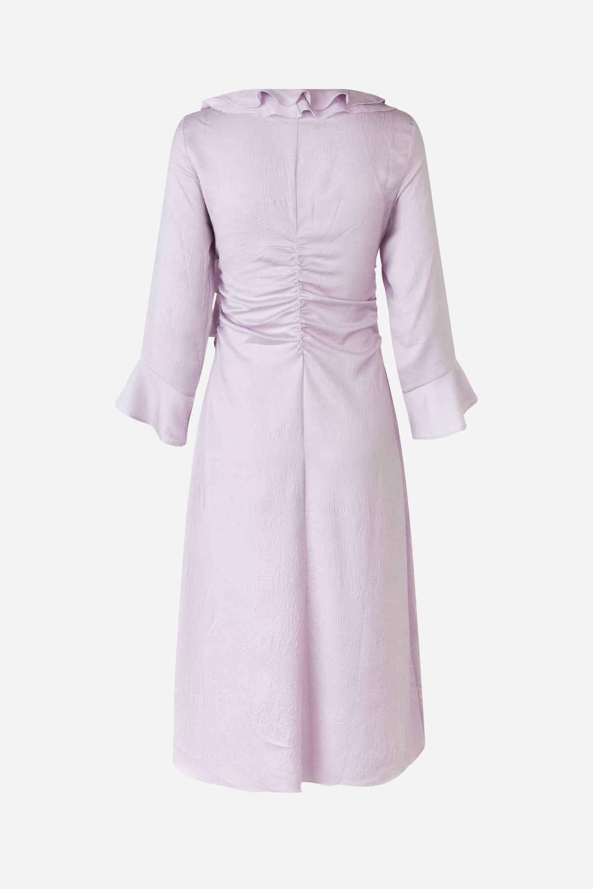 Front view of a pale lilac dress with a crinkled texture, ruffled neckline, ruched waist, long sleeves and flared cuffs.