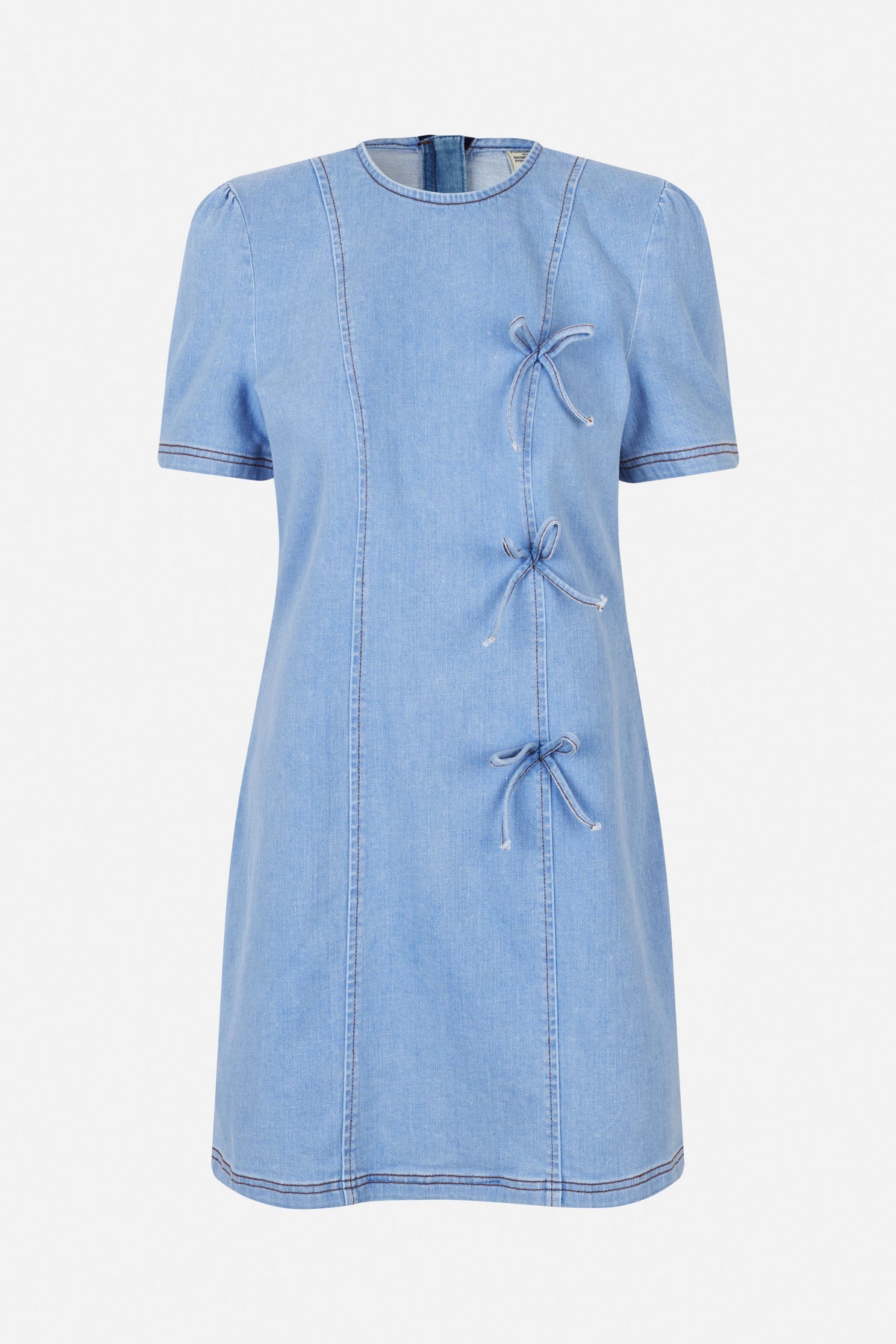 Front view of a light blue denim dress with short puff sleeves, contrast stitching and bow-tie closures along the side.