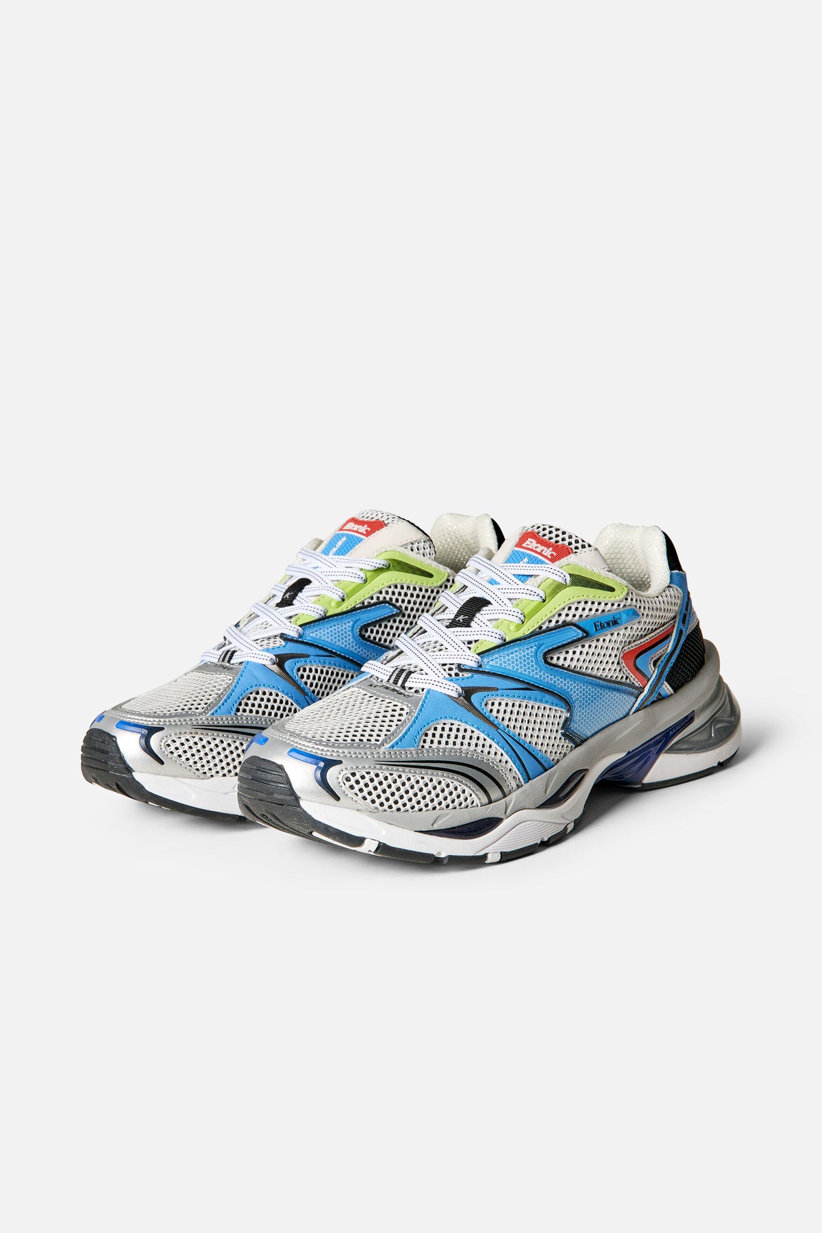 Pair of white mesh running shoes with bright blue and lime-green panels, white laces, and chunky grey-and-white soles, shown from the front and side.