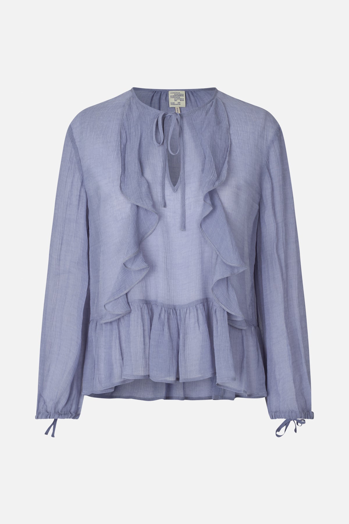 Front view of a pale blue textured long-sleeved blouse with a tie neckline, cascading ruffles, and a gathered peplum hem.