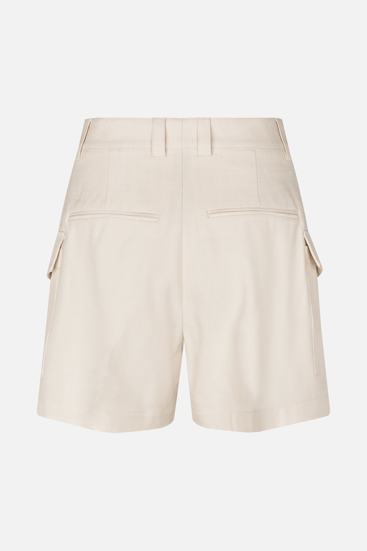 Back view of cream tailored shorts with belt loops, two welt pockets and flap pockets at the sides.