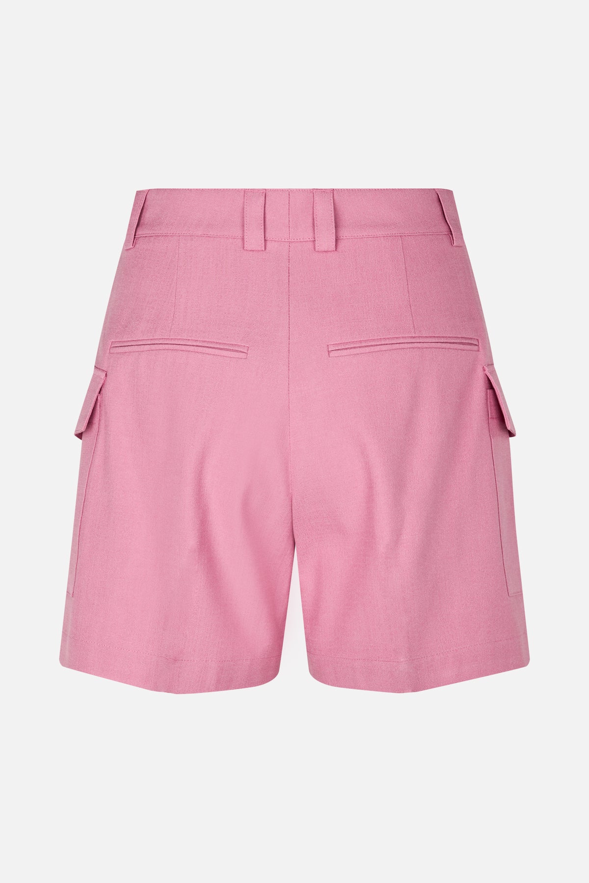 Back view of plain pink wide-leg shorts with belt loops, rear welt pockets and flap cargo pockets at the sides.