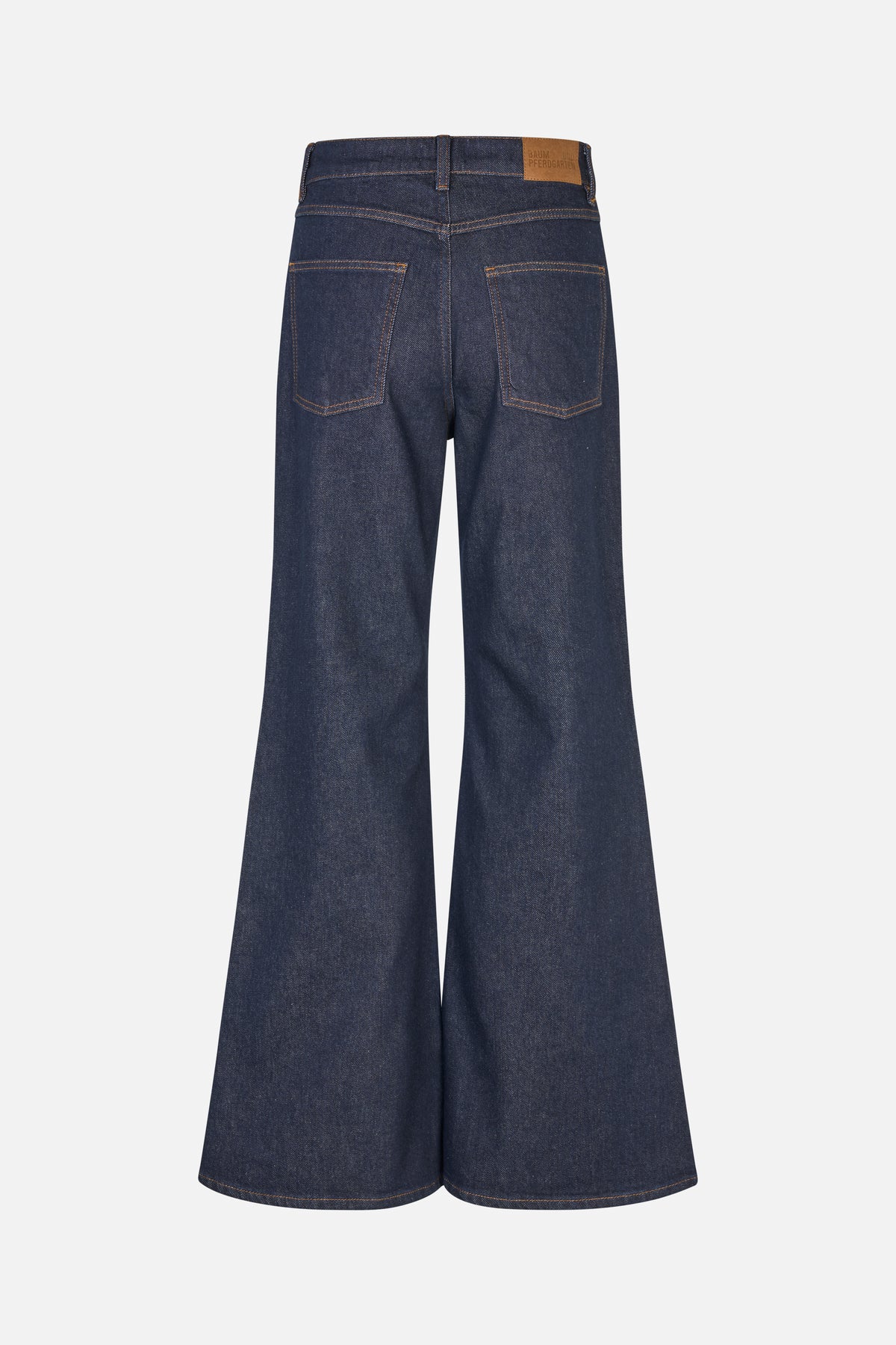 Back view of dark indigo wide-leg jeans with two patch pockets, contrast tan stitching and a tan waistband patch.