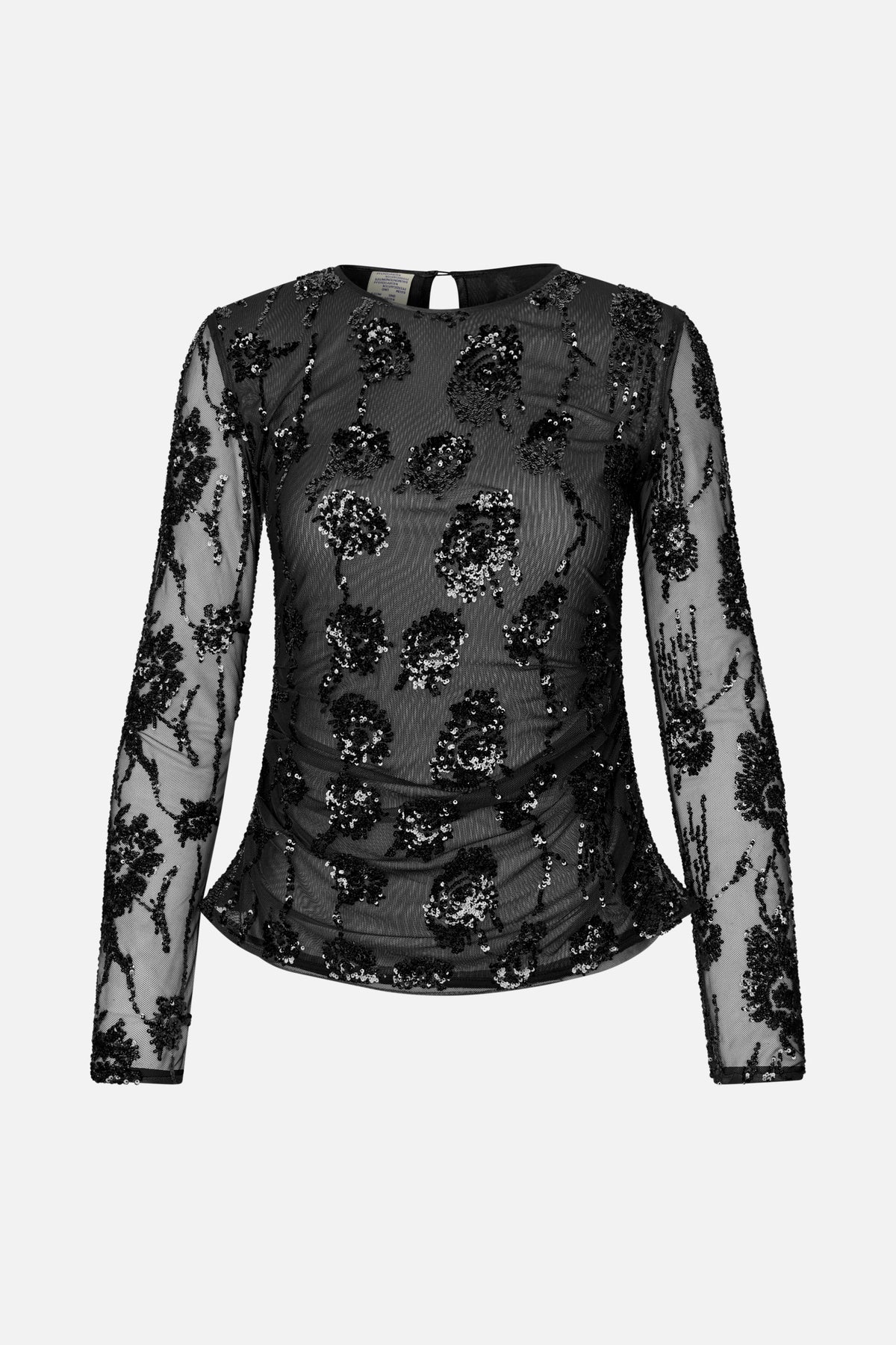 Front view of a black sheer mesh top with long sleeves, floral sequin embellishments and a gathered waist.