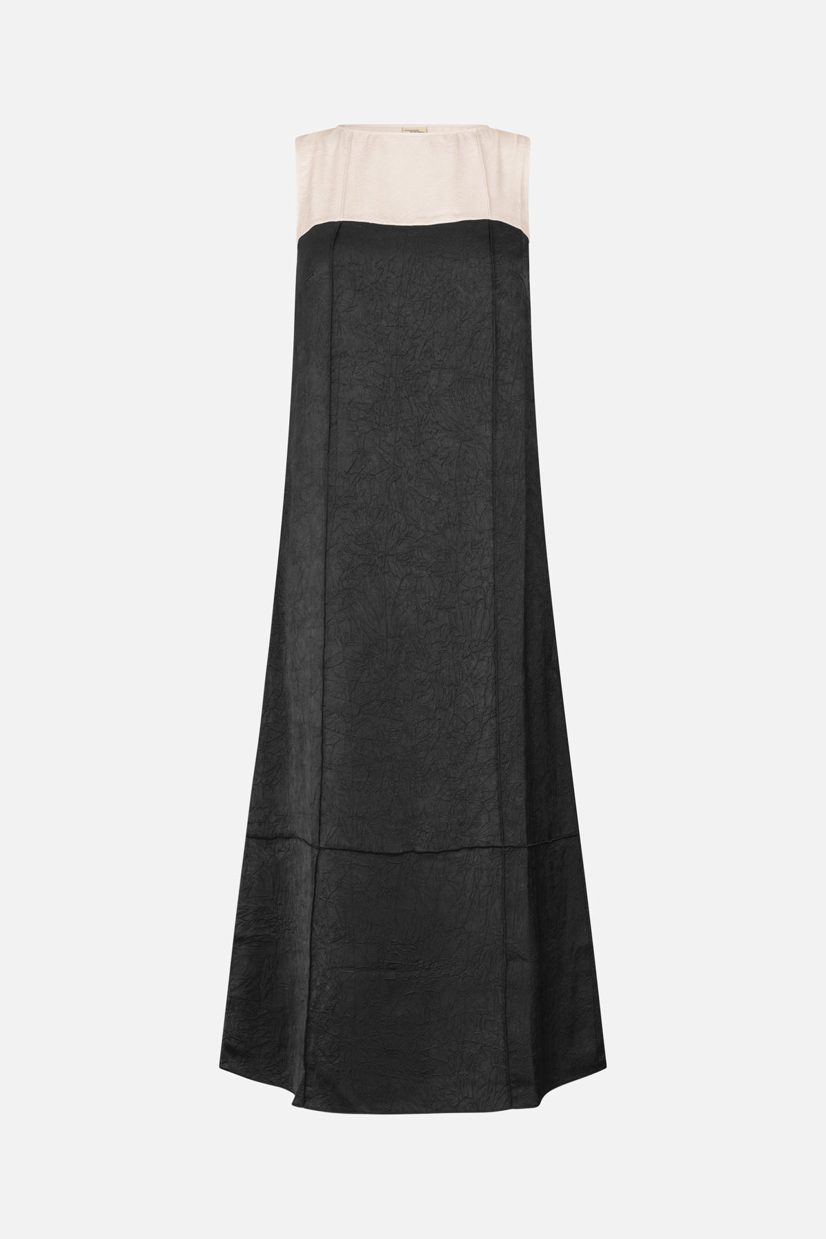 Front view of a long sleeveless dress with a pale ivory upper panel, black crinkled-texture skirt, and square neckline