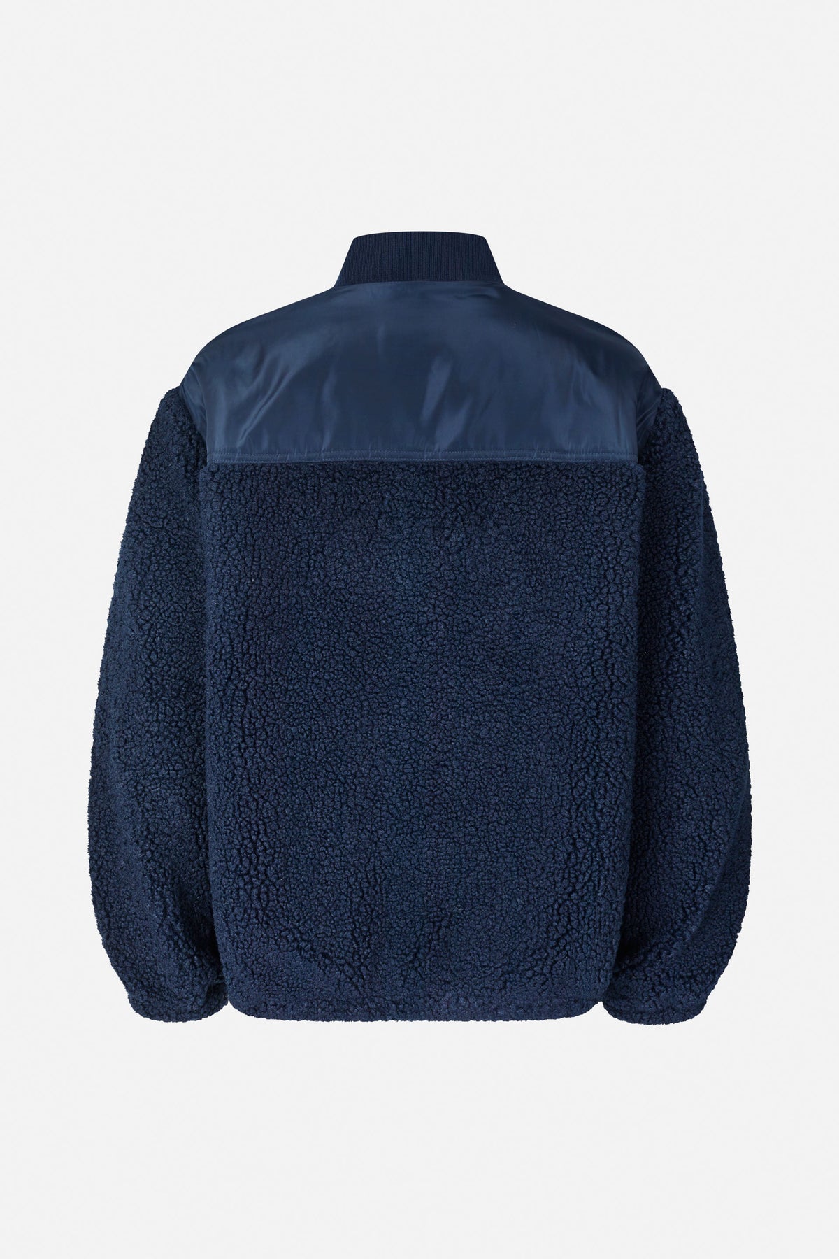 Back view of a navy textured jacket with a smooth shoulder panel and ribbed stand collar.