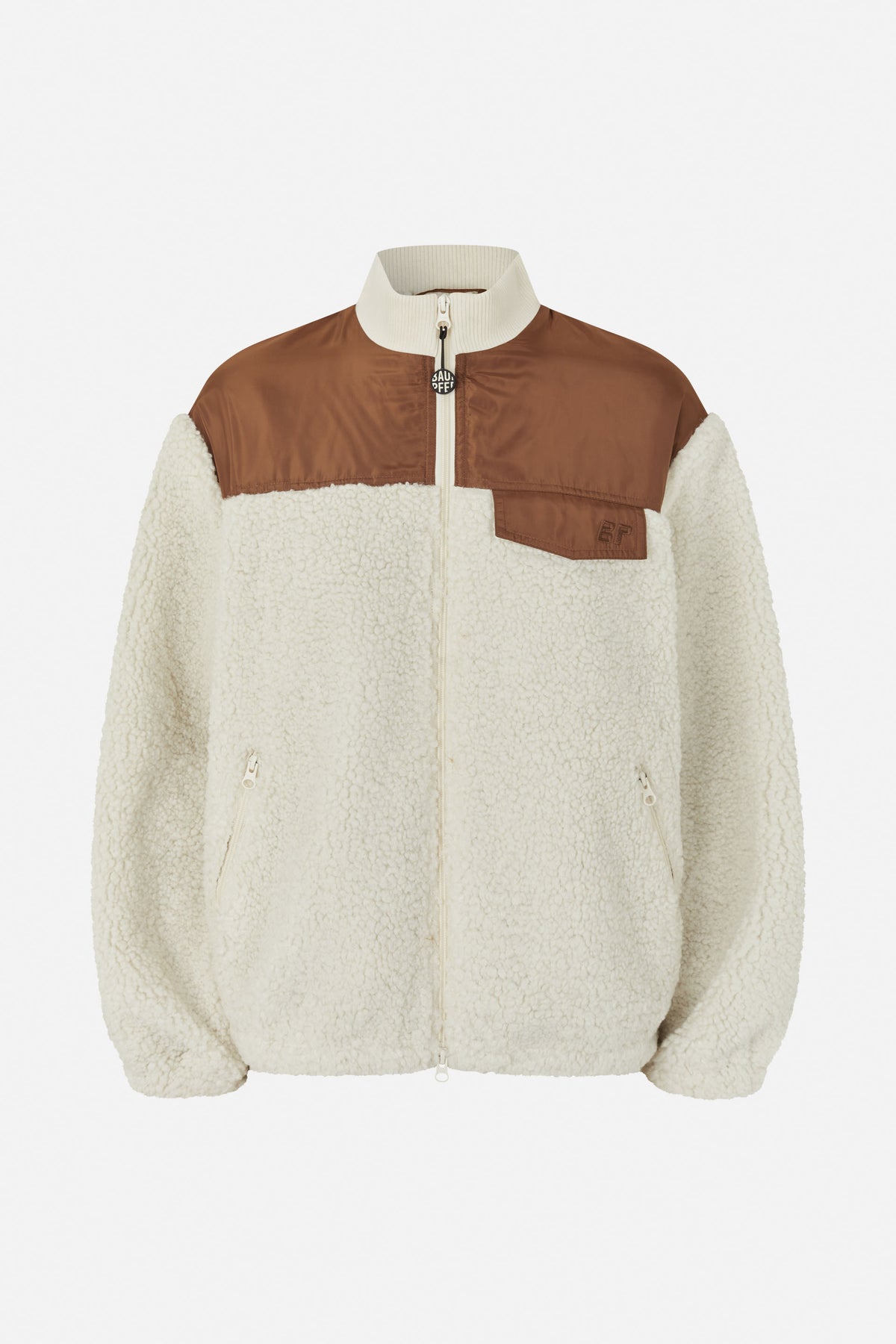 Front view of an ivory fleece zip jacket with a contrasting brown chest yoke, stand collar and two angled pockets.