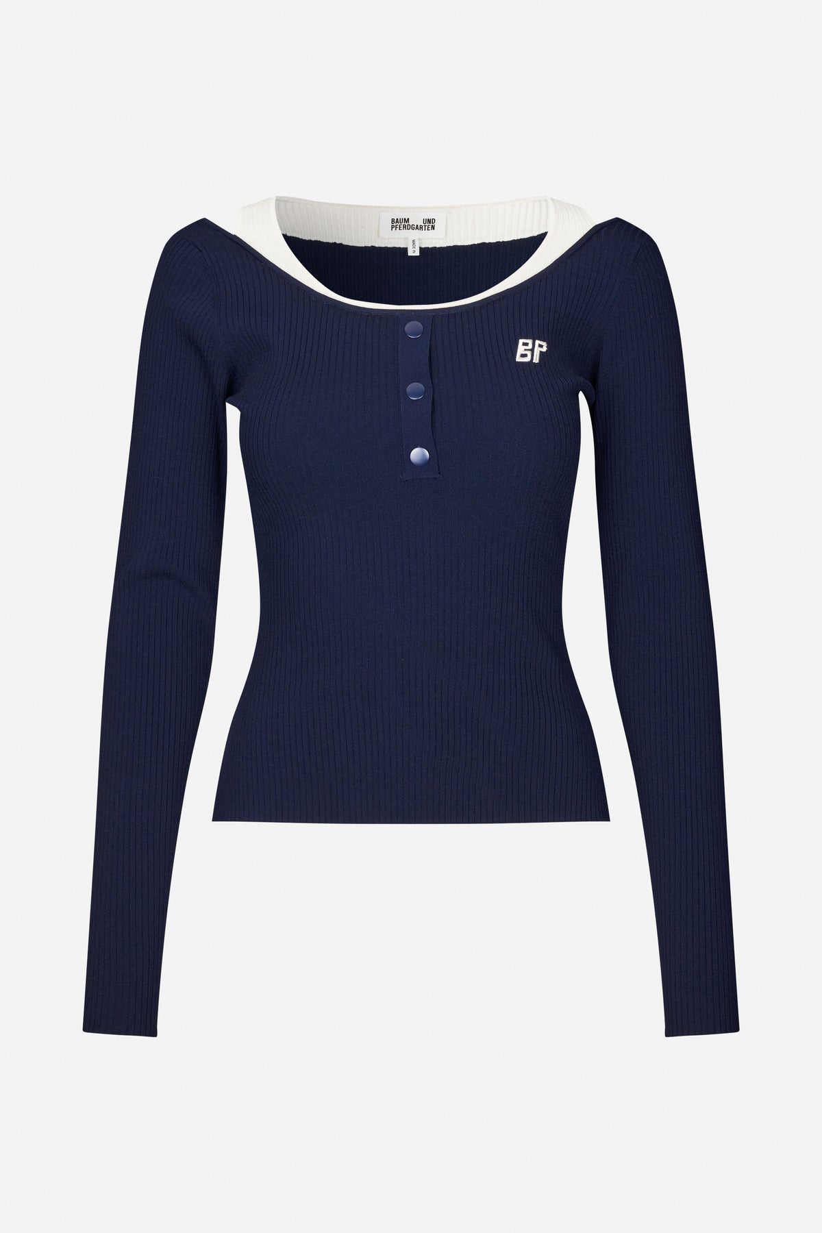 Front view of a navy ribbed long-sleeve top with a white contrast neckline, three front buttons and a small embroidered emblem.