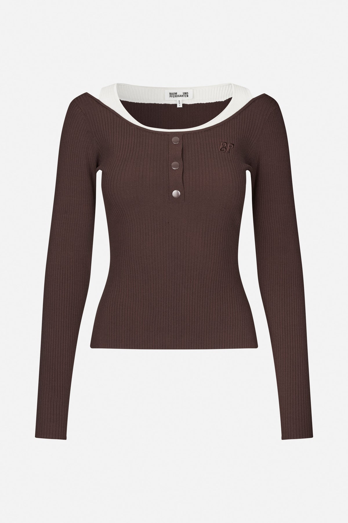 Dark brown ribbed long-sleeve top with a white layered neckline, three front snaps and small chest embroidery, shown from the front.