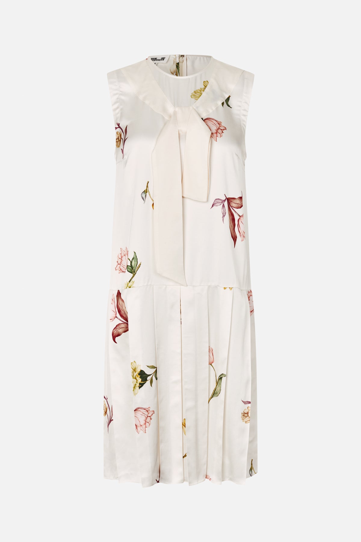 Front view of a sleeveless ivory dress with scattered floral print, a wide neckline tie and a pleated lower skirt.