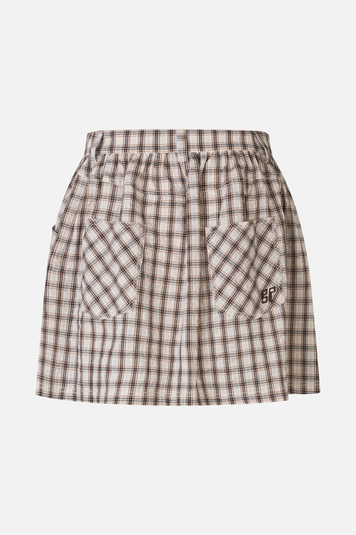 Front view of a beige and brown plaid skirt with a gathered waist and two large patch pockets, one embroidered with BP.