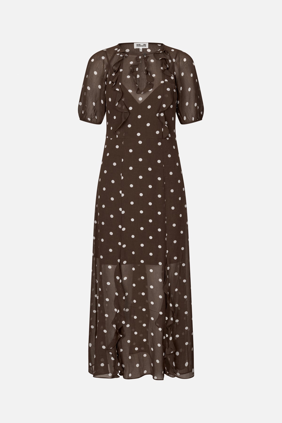Front view of a sheer brown ankle-length dress with white polka dots, elbow-length sleeves and cascading ruffles down the front.