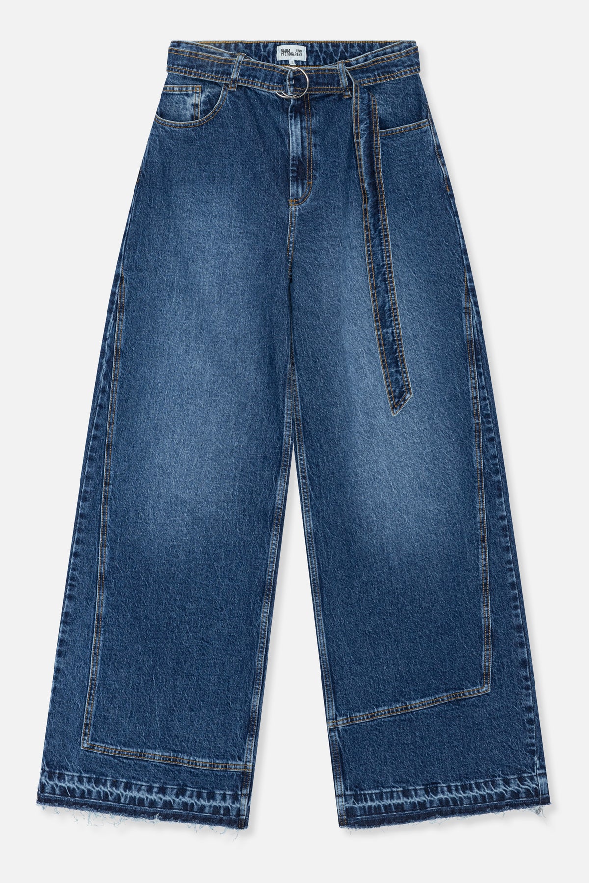 Front view of wide-leg blue denim jeans with contrast stitching, a metal ring belt, large leg panels and frayed hems.