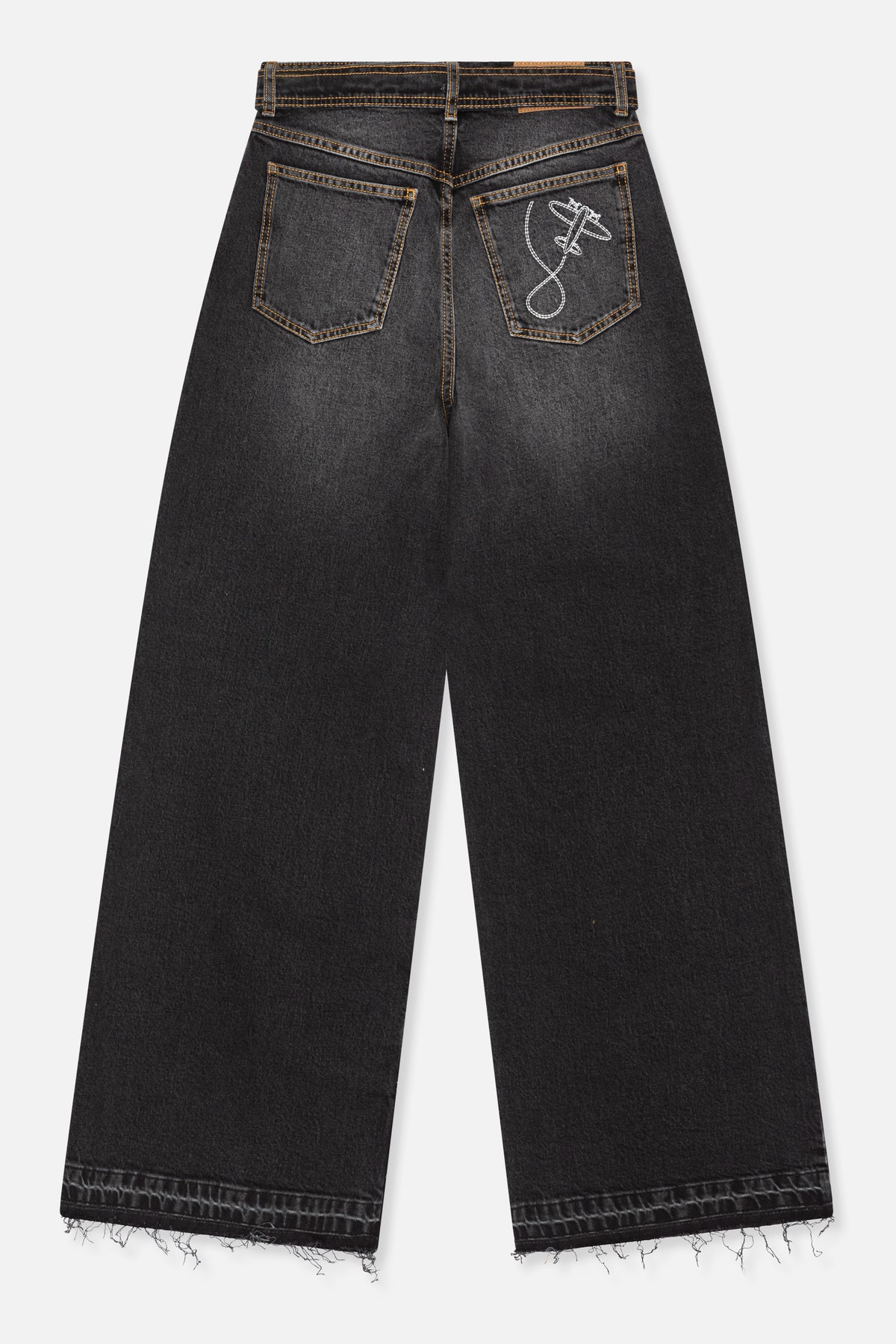 Back view of charcoal-black wide-leg jeans with tan contrast stitching, a white embroidered pocket motif and frayed hems.