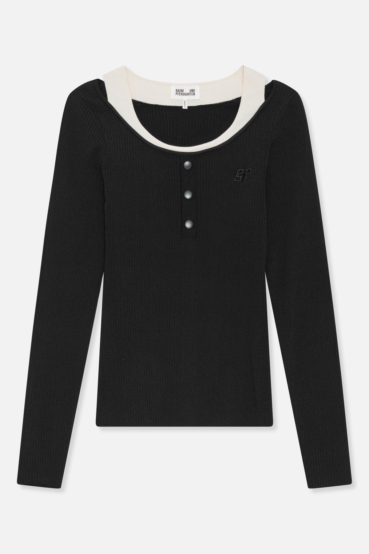 Front view of a black ribbed long-sleeve top with a cream contrast neckline, three front buttons and a small chest emblem.