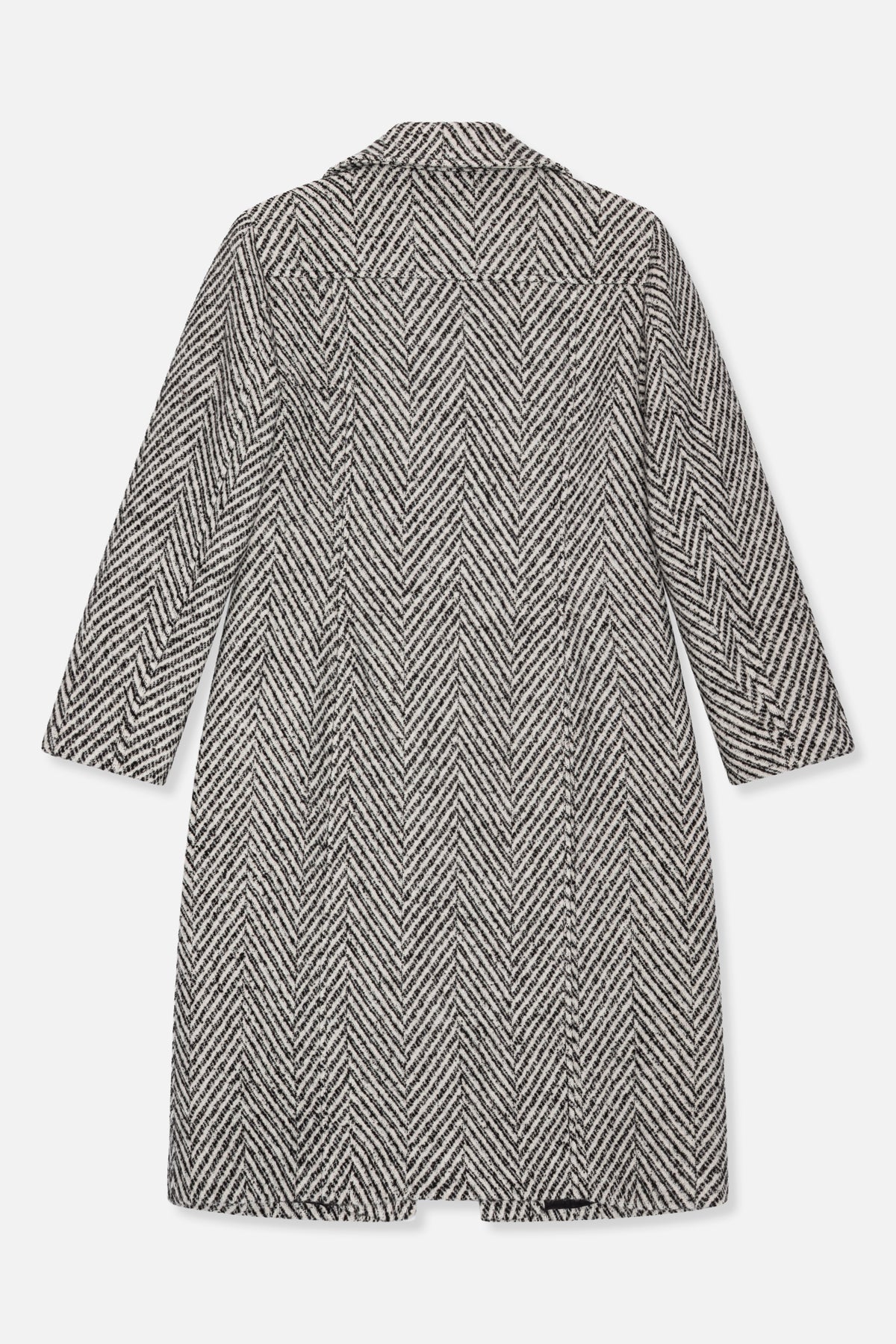 Back view of a long black-and-white coat with a bold chevron pattern, wide collar and long sleeves.