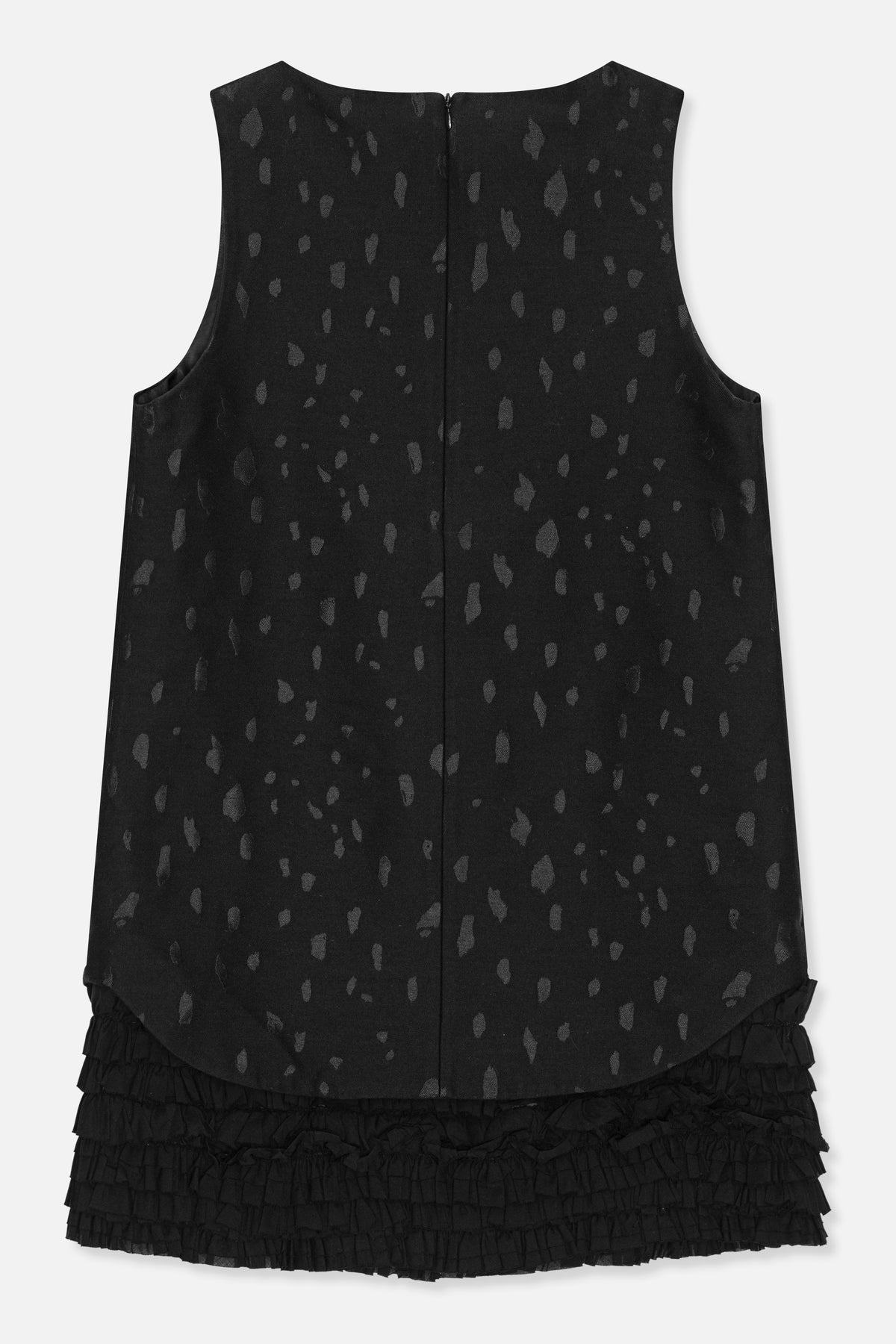 Back view of a black sleeveless dress with scattered gray abstract spots, a center-back zipper and layered ruffled hem.