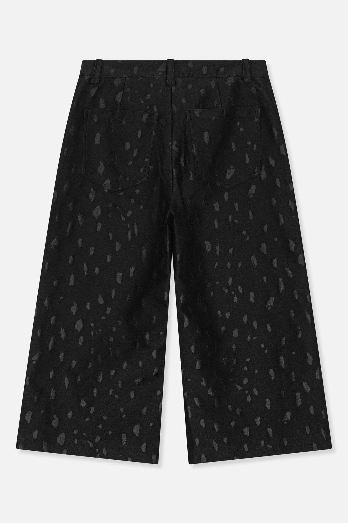 Back view of black wide-leg trousers with an irregular tonal gray pattern, belt loops and two patch pockets.