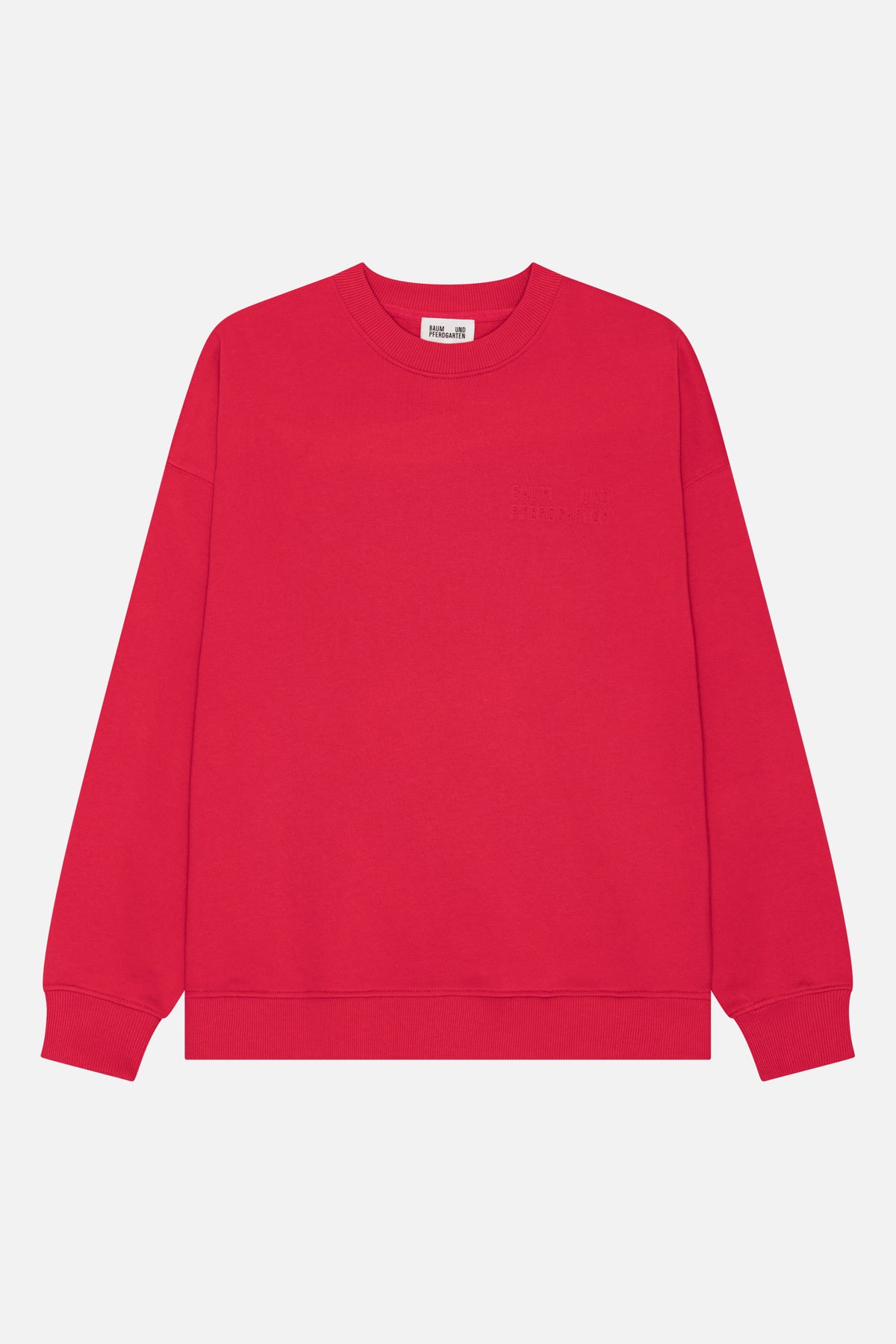 Front view of a bright red crew-neck sweatshirt with ribbed collar, cuffs and hem, and subtle tonal chest lettering.