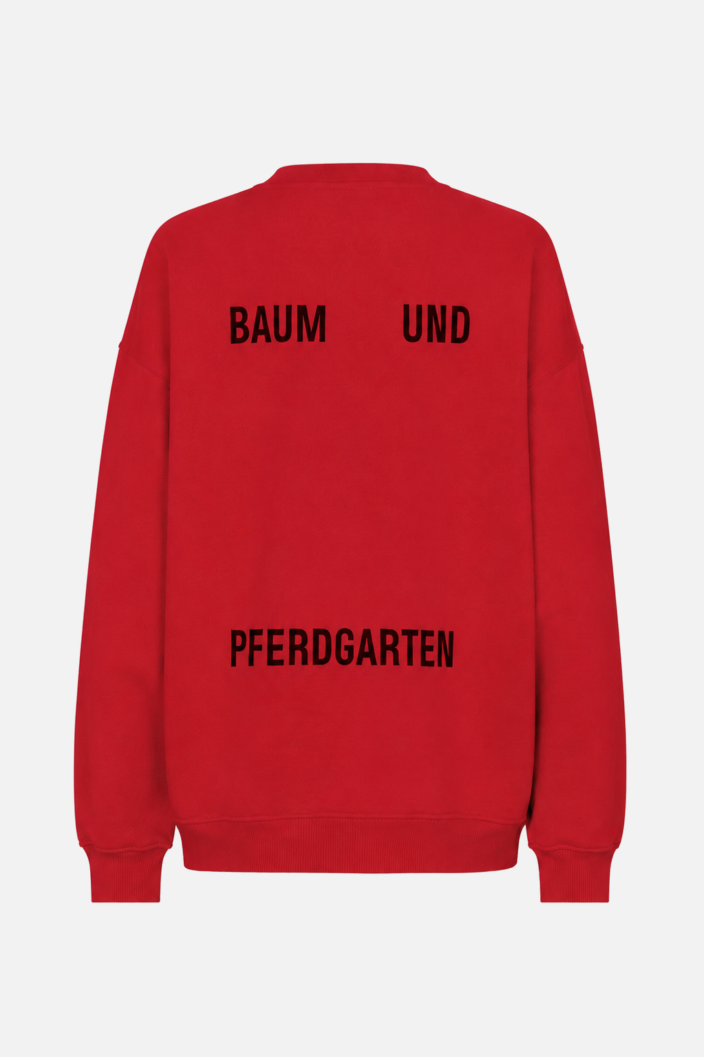 Back view of a red sweatshirt with black Baum und Pferdgarten lettering across the back.