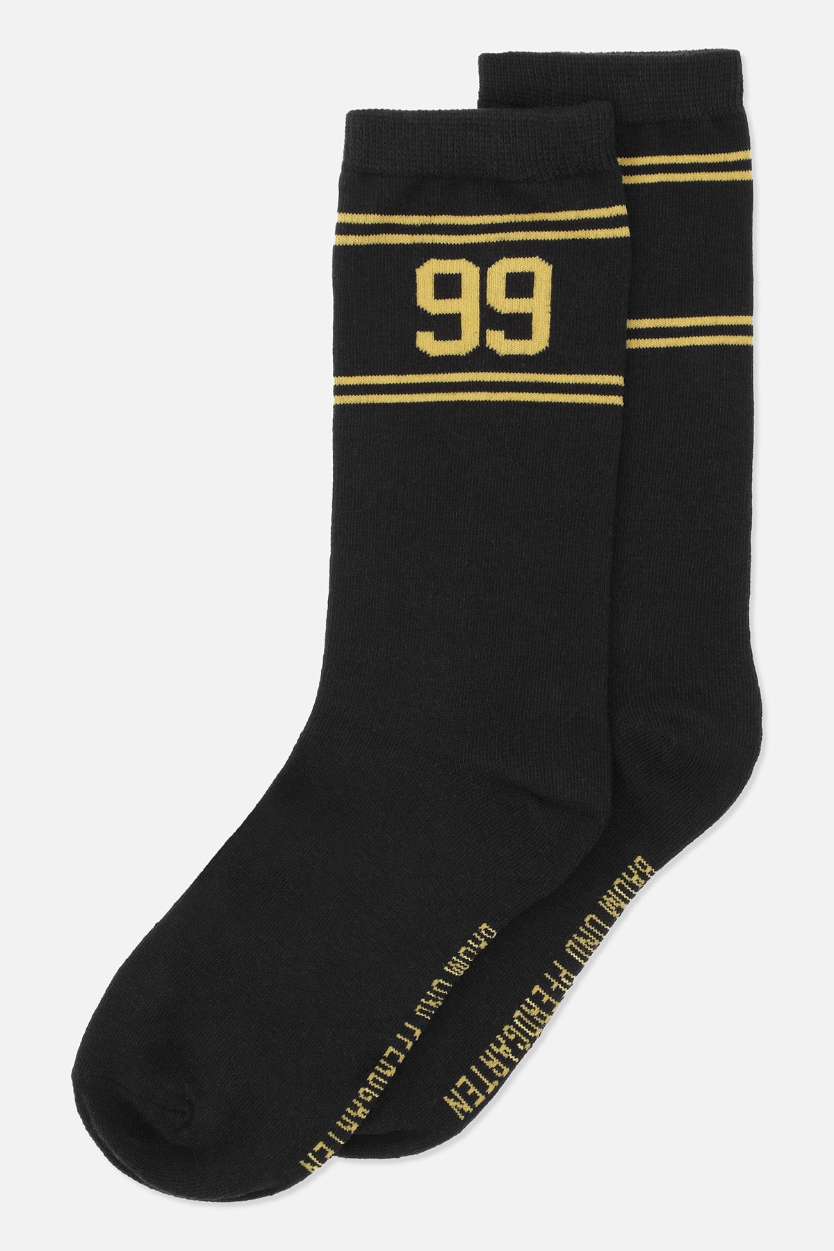 Pair of black crew socks with yellow stripes, a large “99” motif, and lettering along the soles.