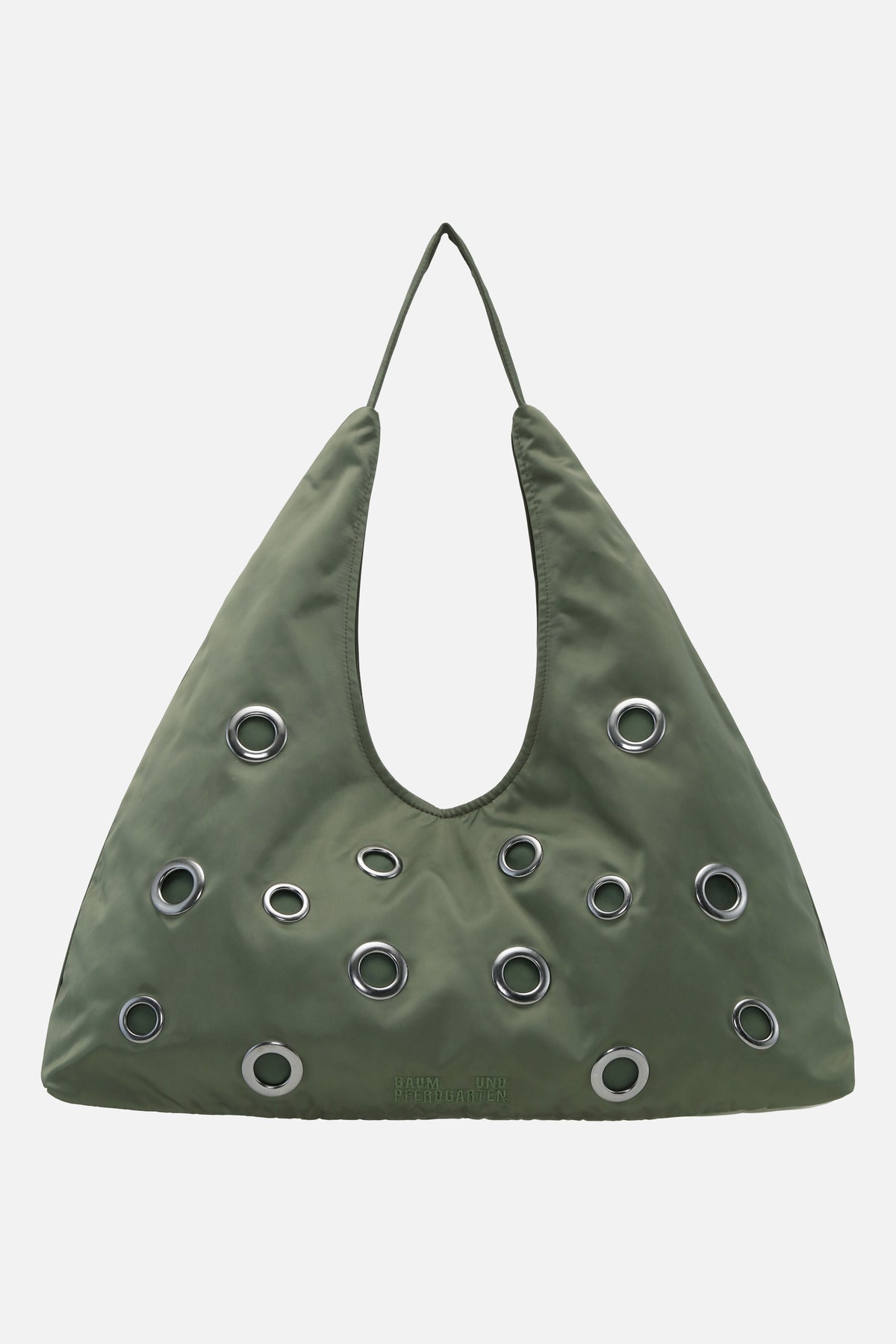 Front view of a sage green shoulder bag with a long strap, large cutout handle, and scattered silver eyelets.