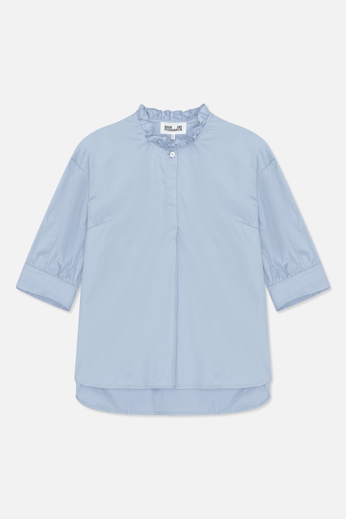 Light blue front-view blouse with a ruffled stand collar, button placket, elbow-length sleeves and wide cuffs.