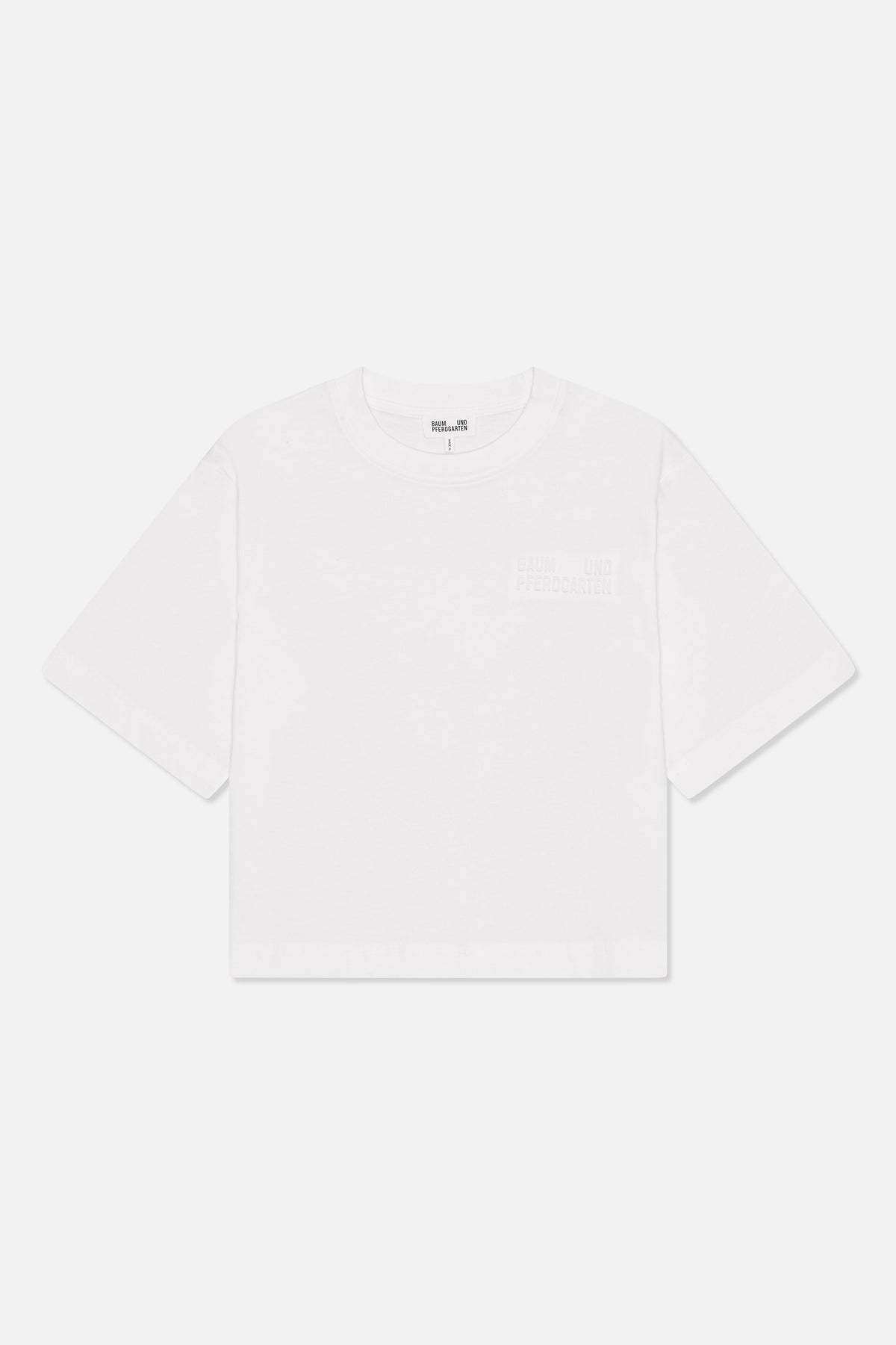 White short-sleeved crew-neck T-shirt, front view, with subtle tonal Baum und Pferdgarten lettering on the chest.