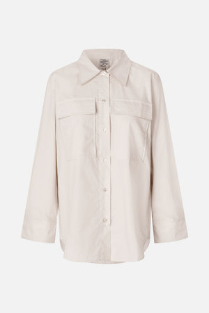 Front view of an ivory long-sleeved button-up shirt with a pointed collar and two large chest pockets.