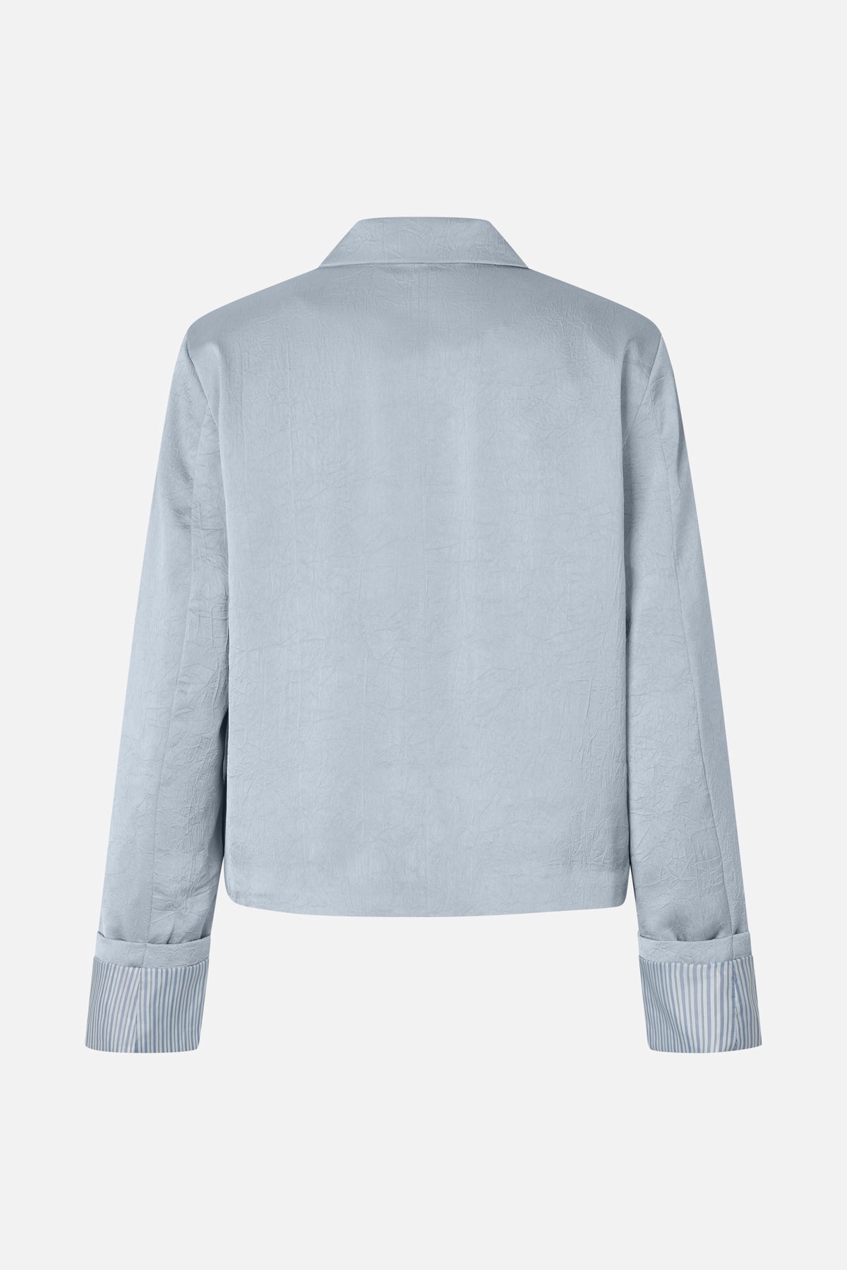 Back view of a pale blue crinkled shirt with a pointed collar and blue-and-white striped cuffs.