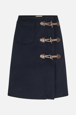Front view of a dark navy A-line skirt with a large patch pocket and three brown toggle fasteners.