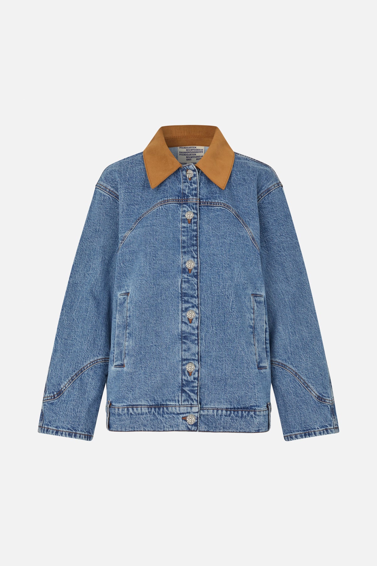 Front view of a blue washed denim jacket with a contrasting tan pointed collar, logo buttons and curved seam detailing.