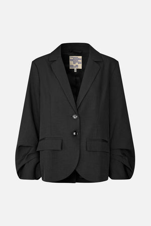 Front view of a black tailored blazer with notched lapels, two buttons, flap pockets and gathered sleeves.