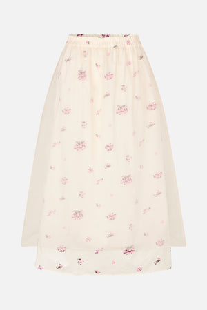 Ivory sheer skirt with an elasticated waistband, scattered pink and grey floral print, and a shorter opaque lining