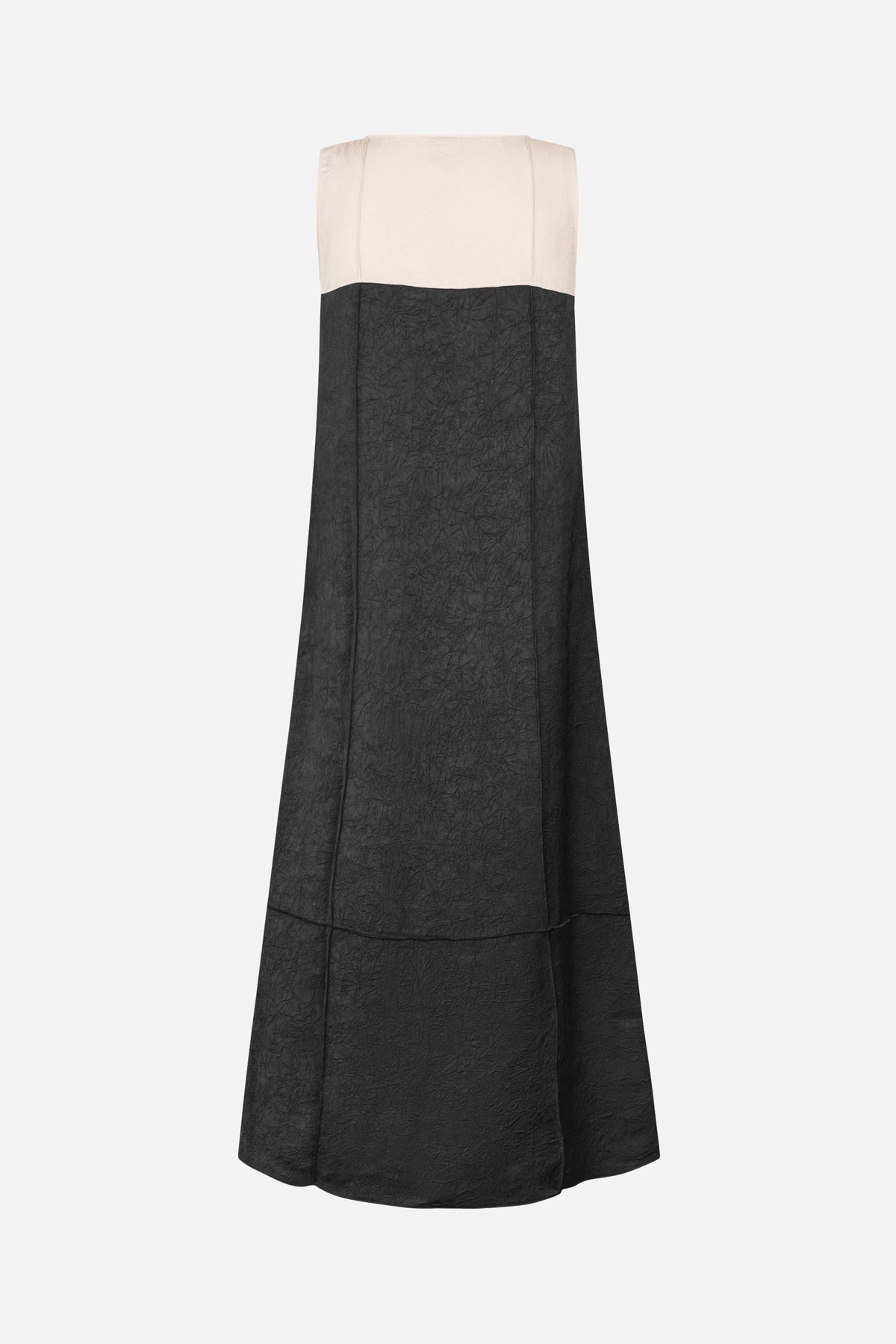 Back view of a long sleeveless dress with a pale cream upper panel, black crinkled skirt and visible vertical seams.