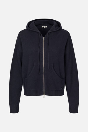 Front view of a dark navy knitted hooded zip-up jacket with a silver zipper, front pockets, and ribbed cuffs and hem.
