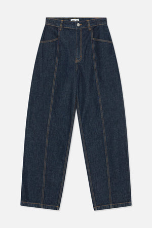 Front view of dark indigo wide-leg jeans with contrast tan stitching, a button closure and curved front pockets.
