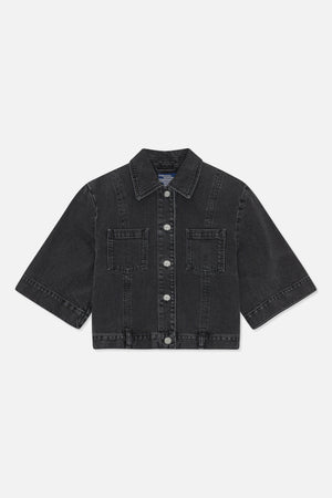 Front view of a charcoal-black denim jacket with a pointed collar, button front, two chest pockets and wide sleeves.