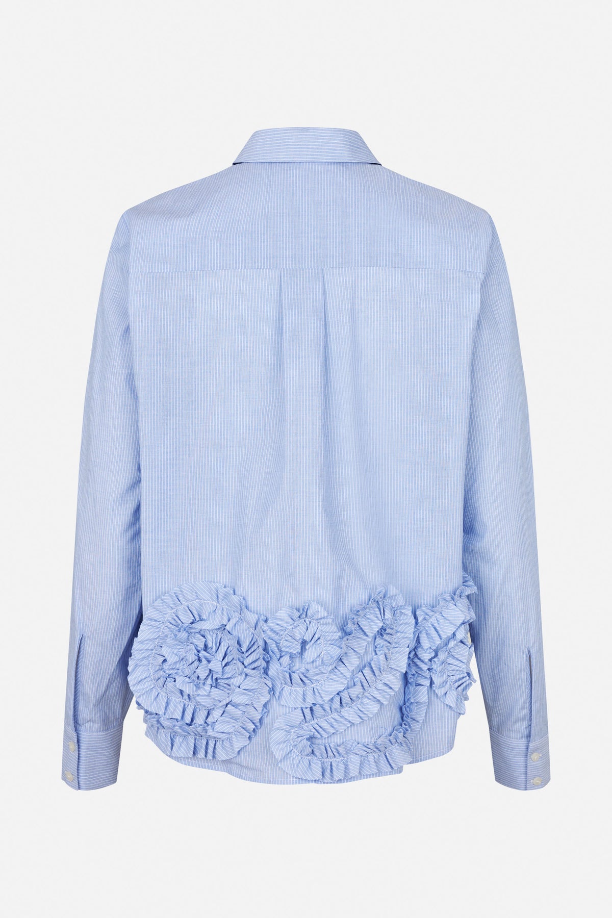 Back view of a light blue pinstripe shirt with a pointed collar, long sleeves and voluminous ruffles across the lower back.