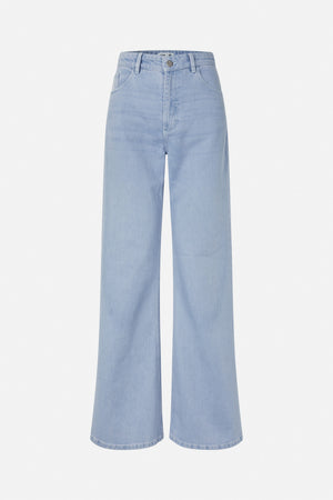 Front view of light blue washed denim jeans with a button waistband, curved front pockets and wide straight legs.