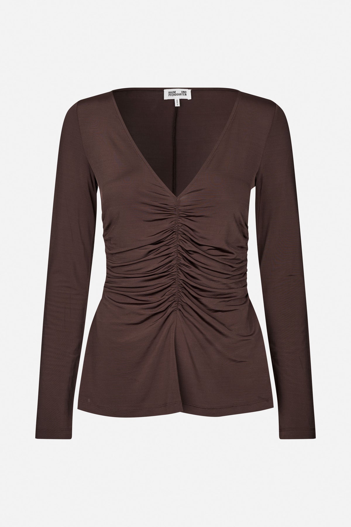 Front view of a dark brown long-sleeve top with a deep V-neck and gathered ruching down the center front.