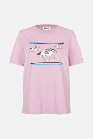 Front view of a pink short-sleeve T-shirt with a graphic of galloping horses and riders in blue and brown accents.