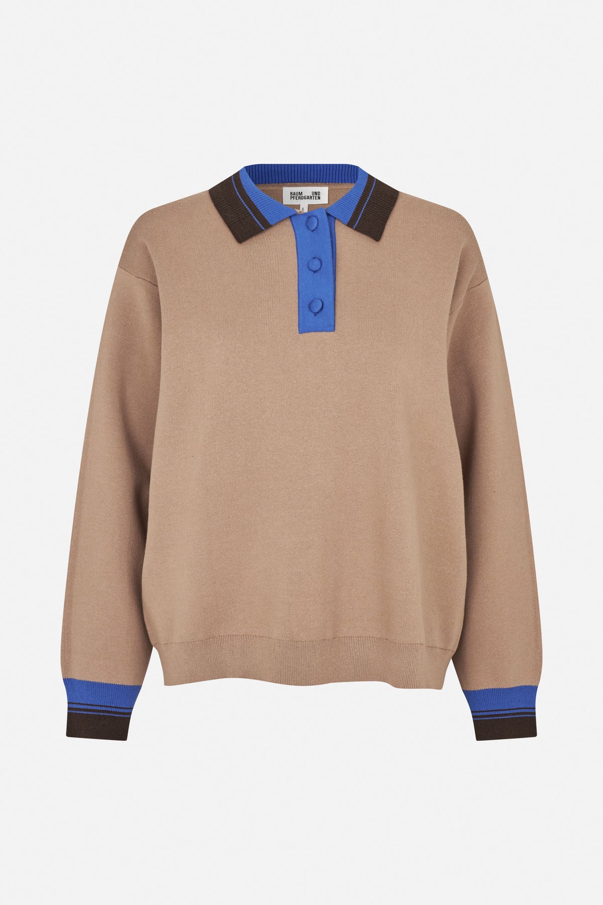 Front view of a beige long-sleeved knit polo with a bright blue button placket and collar, dark brown trim, and striped cuffs.