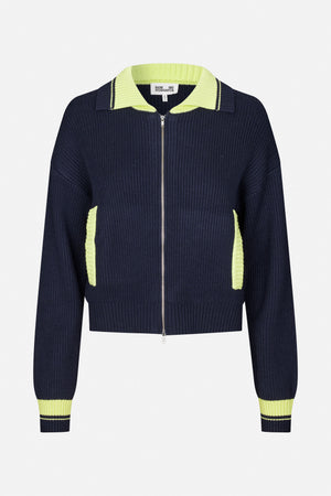 Front view of a navy rib-knit zip cardigan with a lime-green collar, pocket accents and striped cuffs.