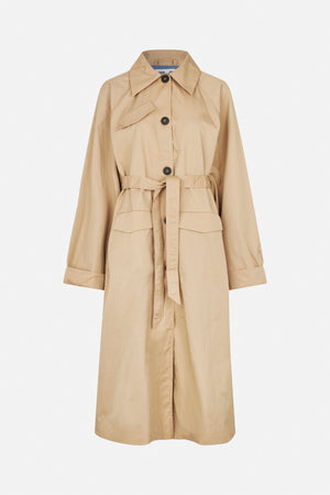Front view of a long tan trench coat with dark buttons, a pointed collar, belted waist and flap pockets.