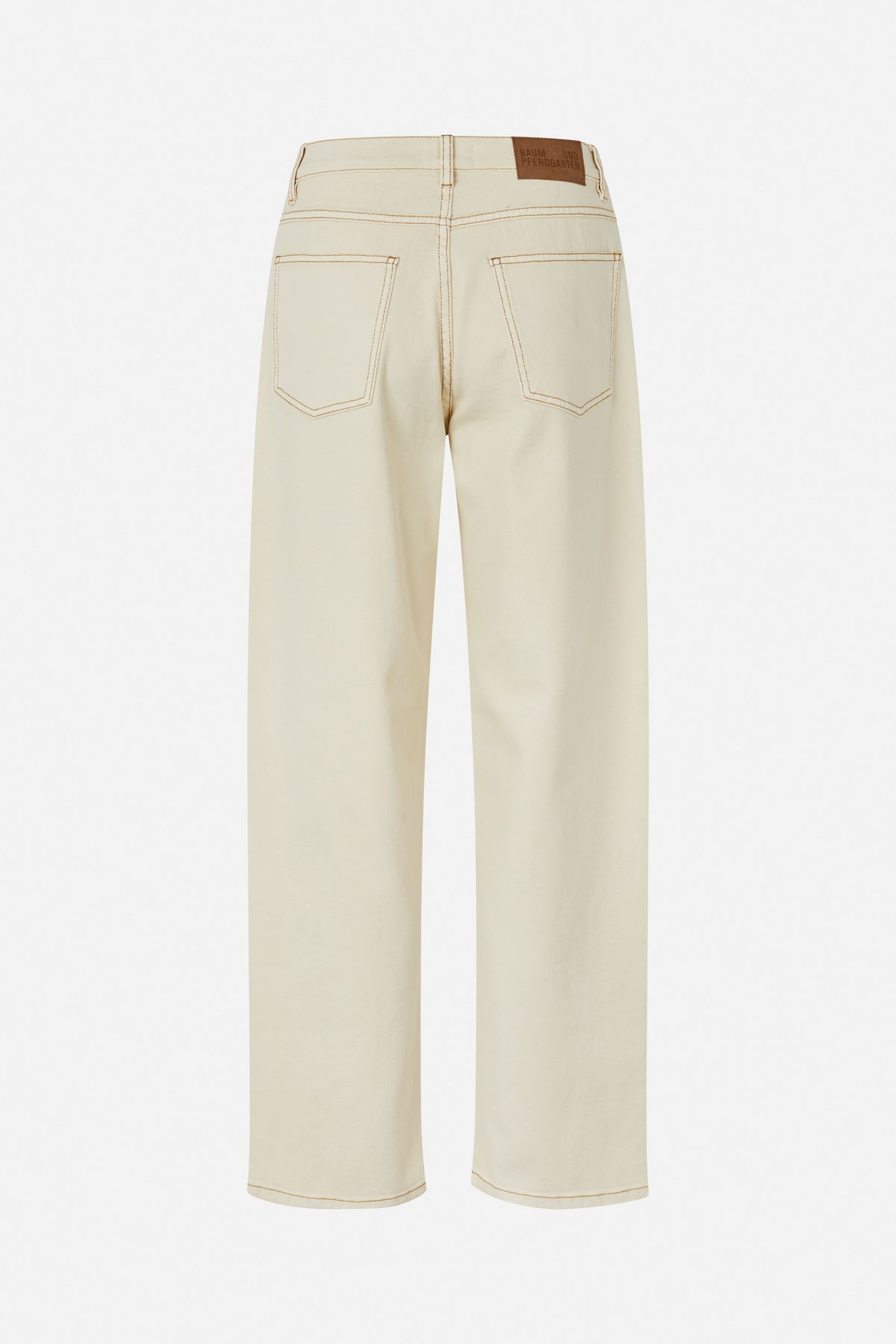 Back view of cream wide-leg jeans with brown contrast stitching, two patch pockets and a leather waistband label.