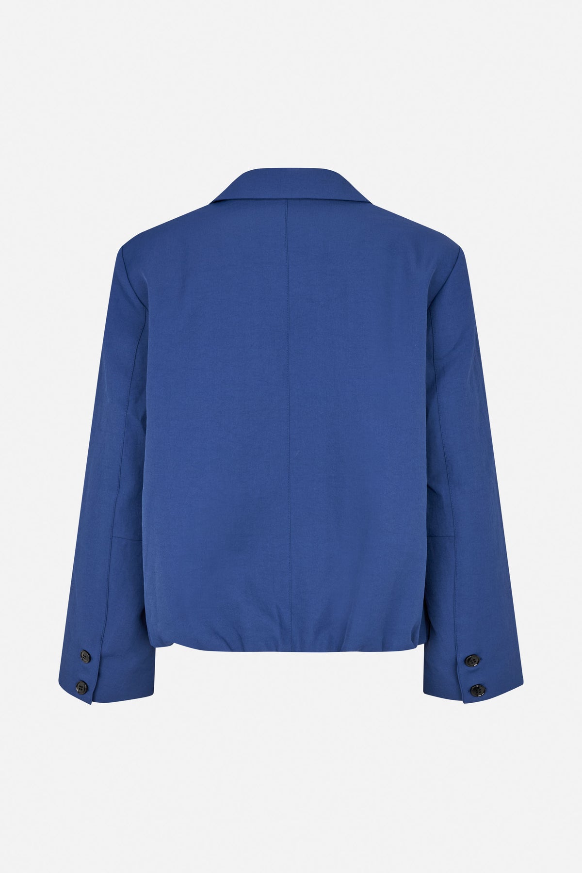 Back view of a cobalt blue jacket with a broad collar, center seam and buttoned sleeve cuffs.